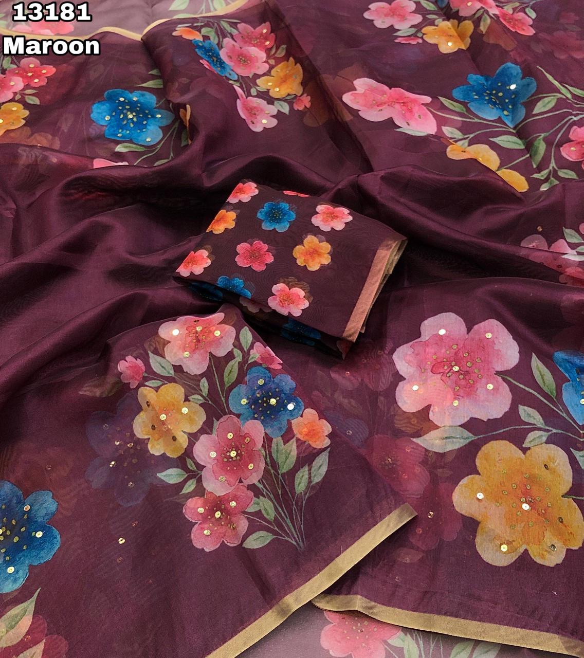 Maroon Organza Saree with Pink Floral Digital Print and Gold Zari Border.